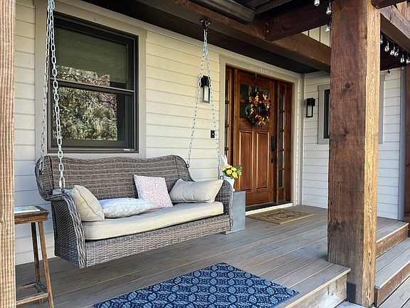 Covered front porch with swing