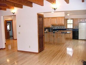living room into kitchen
