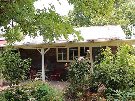 Surrounded by mature garden planted for cut flowers.