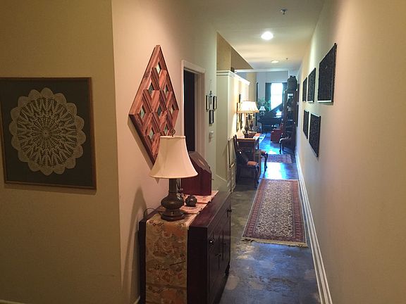 Entryway, looking down hallway to living area