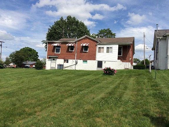 EXTERIOR REAR OF HOUSE ON HUGE LOT, BEAUTIFUL YARD