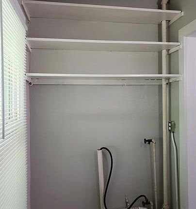 other side of laundry room with hookup for washer