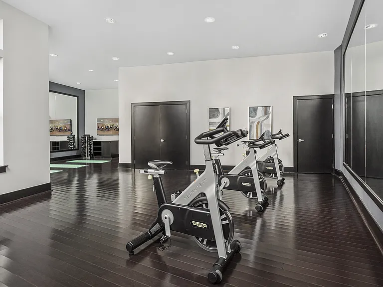 Fully-Equipped Fitness Center with Highly-Specialized Technogym Cardio Machines, Free Weights, Spin Bikes, and Individual Strength Training Machines
