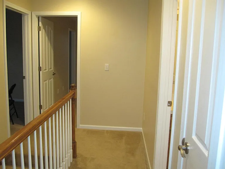 Upstairs landing (updated photos coming soon, new paint, flooring, stair spindles)