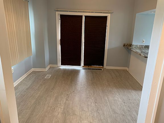Dining room. Sliding Door goes to patio and kitchen on the right.