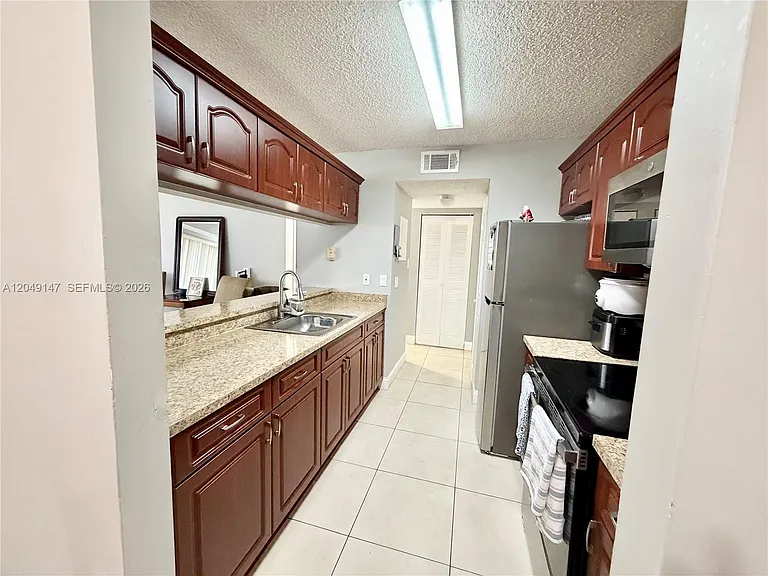 10521 SW 158th Ct #203 — Photo 8