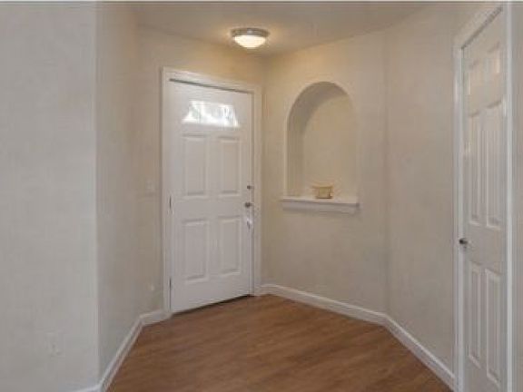 Easy, step-free entrance with a wide doorway, providing smooth, safe access and added convenience for a senior-friendly home.