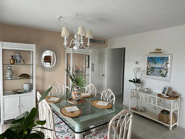 Dining Room and adjacent Balcony Area Sunset Views - 3580 S Ocean Blvd #4A