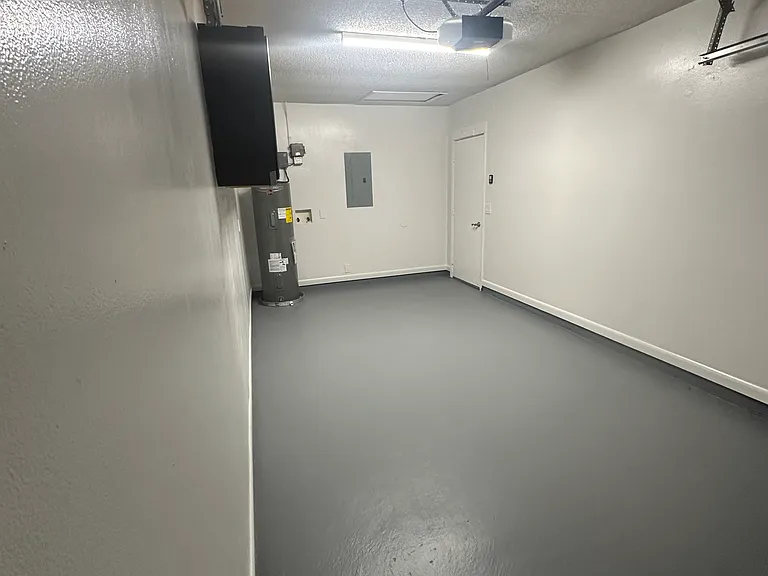Garage, view from covered porch door.