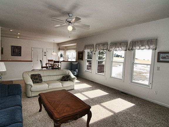 Sunny, open great room with lots of windows