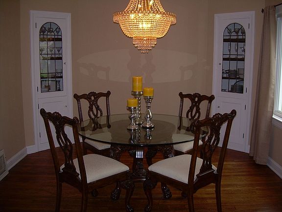 Diningroom with leaded glass corner cabinets