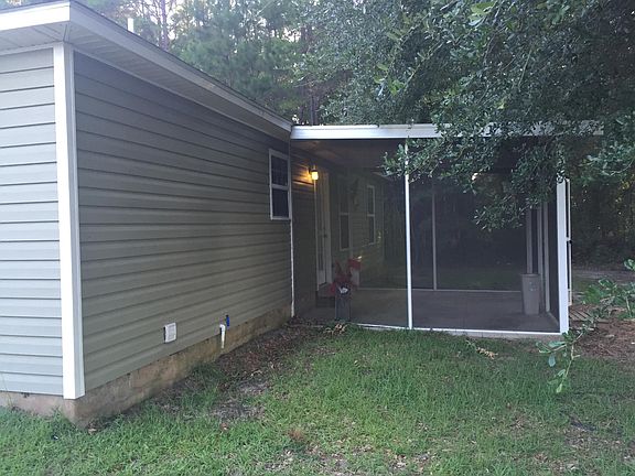 Rear showing screened porch