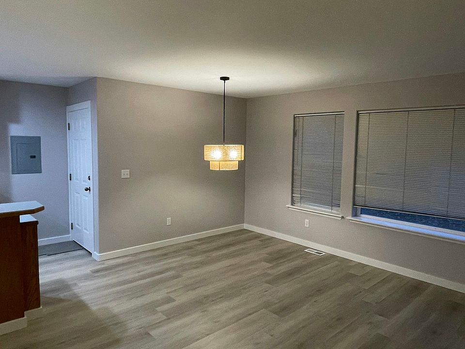 Dining area, new light, all new flooring, trim, and paint