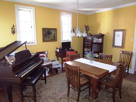Dining Room w/Gorgeous Hardwood Floors.  This Home Has Hardwood Throughout