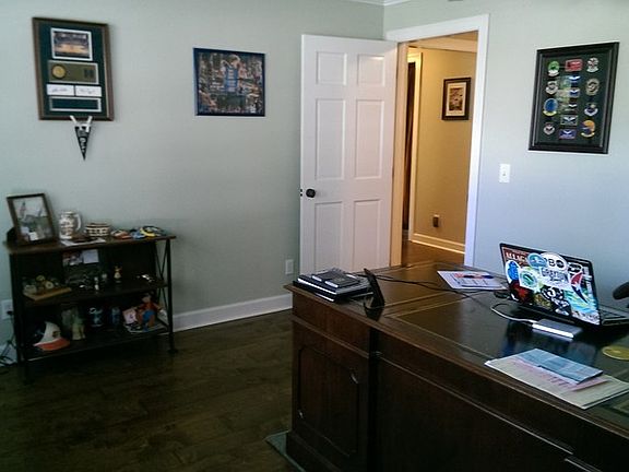 Office
						:
						Office overlooks the front yard through large bay-window.