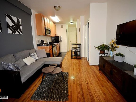 3rd image of 190 E 3rd St APT 5A
