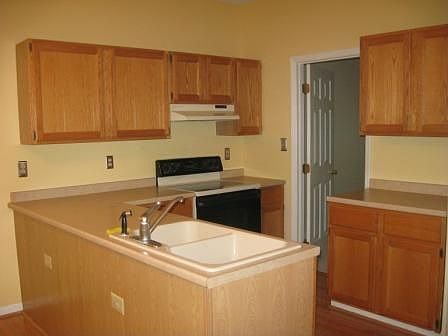 Updated Kitchen w/spacious cabinets.