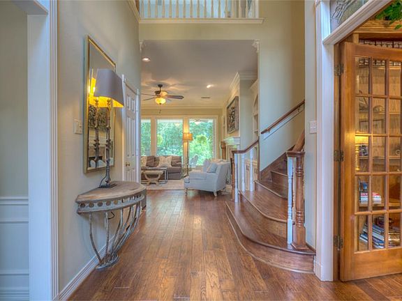 Two story foyer welcomes you to this remarkable home featuring an open floorplan high ceilings, spec