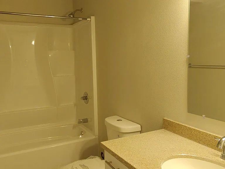 Downstairs Bathroom with bathtub.
