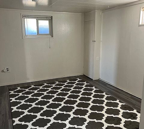 Bedroom 2 with large closet and two windows