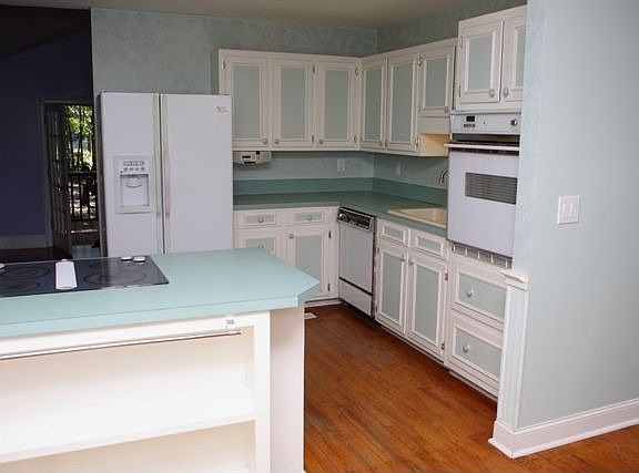 Beautiful kitchen with wood floors.