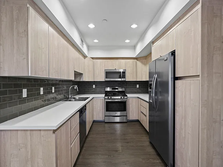 Large-Size Kitchen with Energy-Efficient Appliances and Ample Cabinet Storage