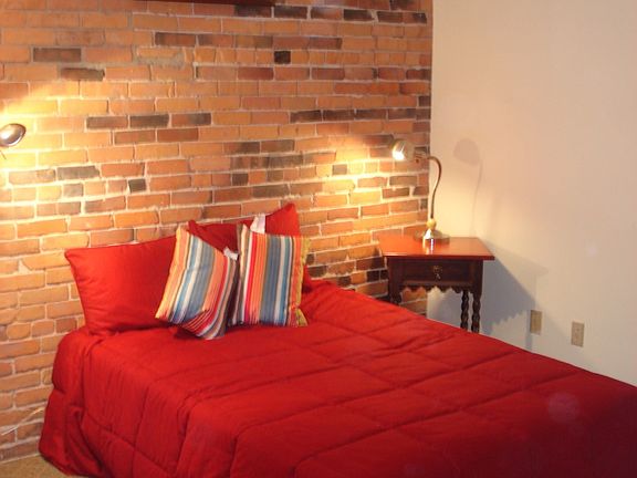bedroom exposed brick