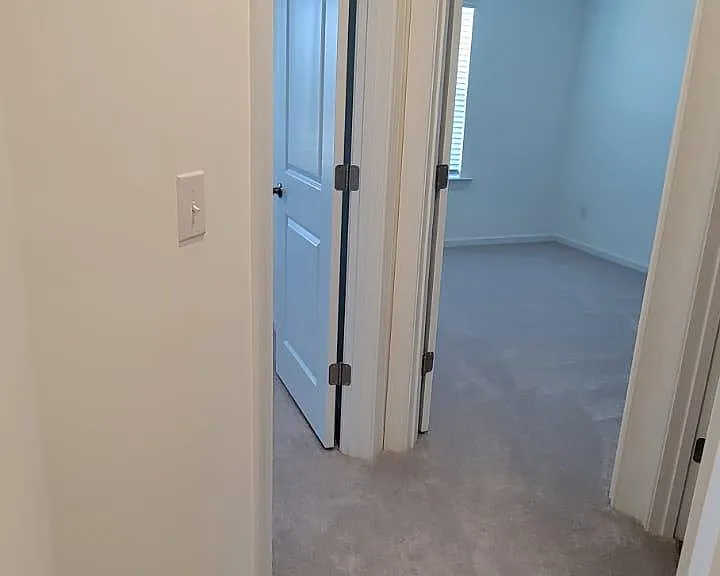 Two bedroom on the left side or the upstairs hallway