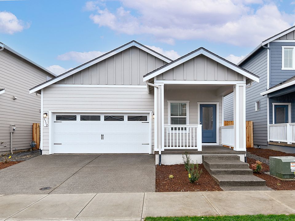 The Aspen is a beautiful single story home with siding.