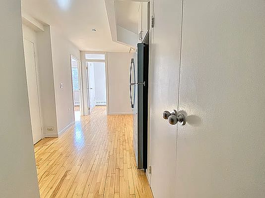 2nd image of 319 E 8th St APT 4A