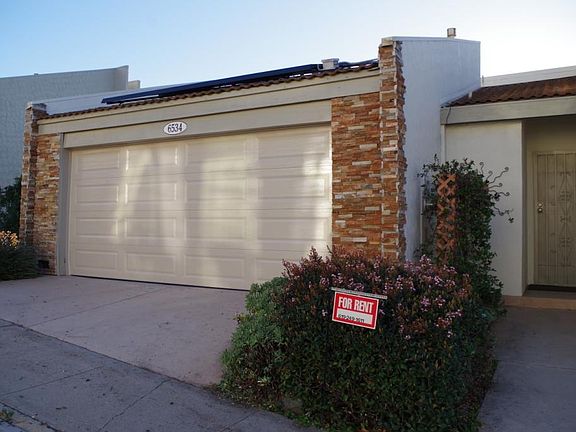 The front door is to the right