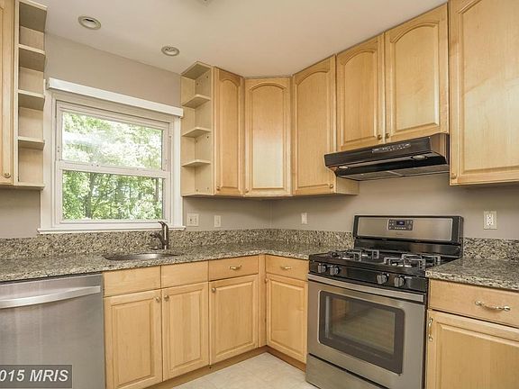 Kitchen w/ granite and stainless steel