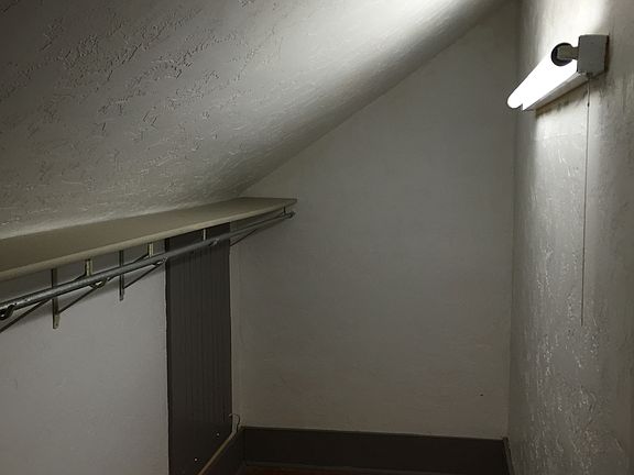 3 of 4 walk-in closets 