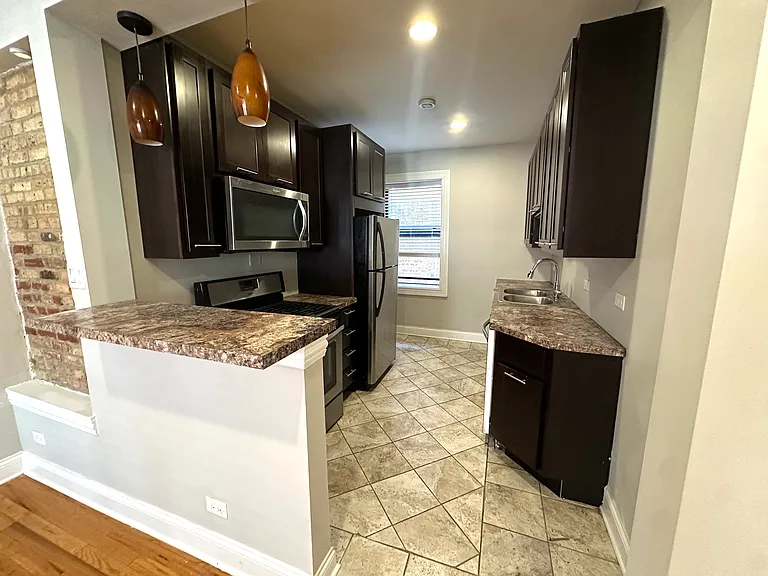 7238 S Coles Ave — Photo 3