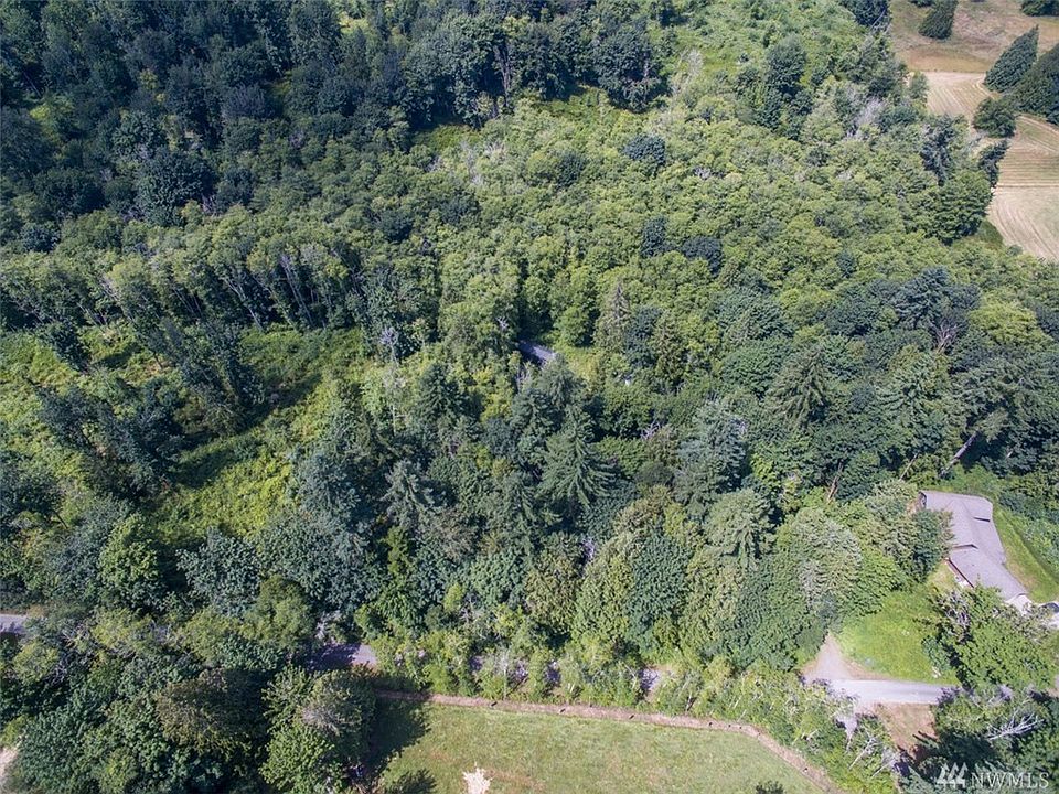 1st image of 9234 NE Country Woods Ln Lot 11