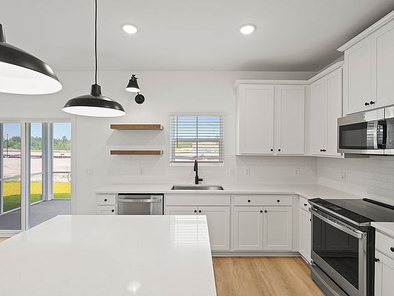 Kitchen with stainless steel appliances