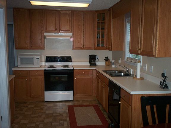 Elegant eat-in kitchen with plenty of cabinet space.