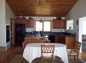 Kitchen has island & wall oven