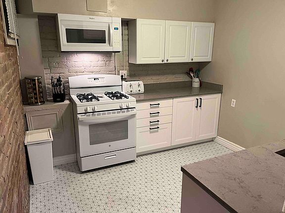 All new appliances, gas stove and fully stocked with dishes, pots and pans and small appliances