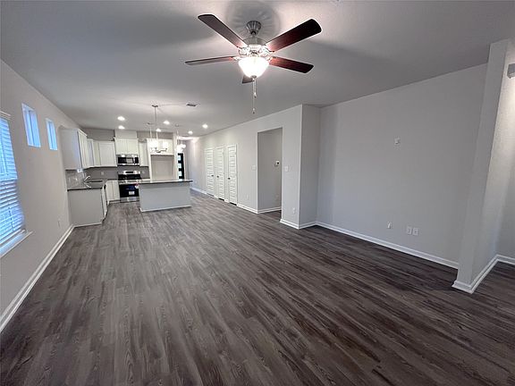 The Kettering II- Family Room into the Kitchen. Home under construction, images used for illustrati