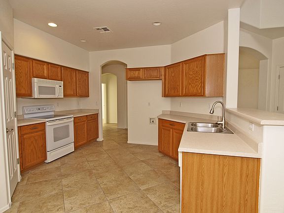 4th image of 18144 W Desert Blossom Dr