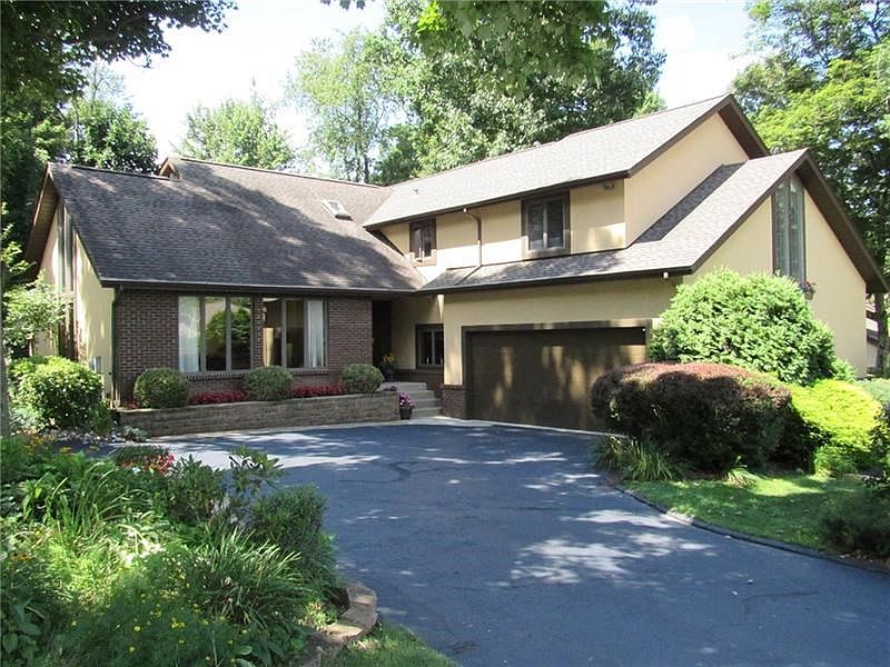 Front Exterior of this large Contemporary home with fantastic resort like backyard!