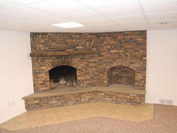 Wood fireplace in lower level