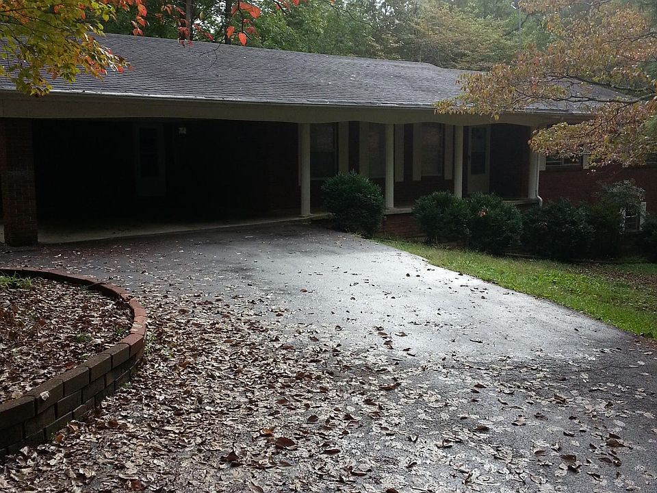 Drive up to house and 2 car carport.