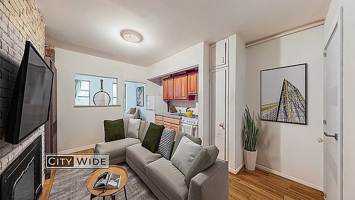 1st image of 309 E 9th St APT 2D