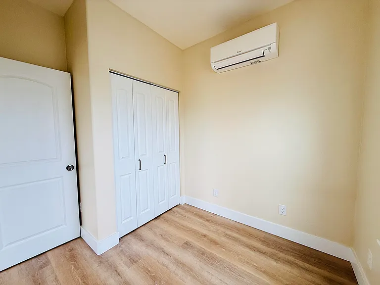 Bedroom #2 with air condition and heating ductless system