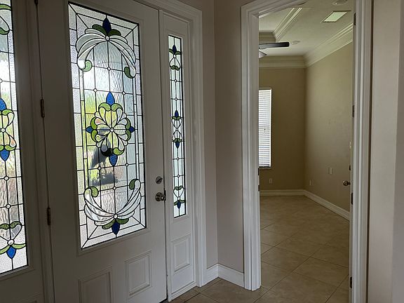 Foyer with door to bonus or 4th bedroom