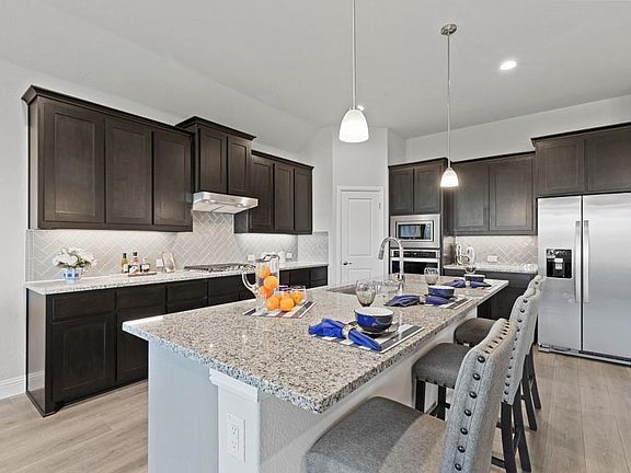 All photos shown here may not depict the specified home & features included are for illustration purposes only