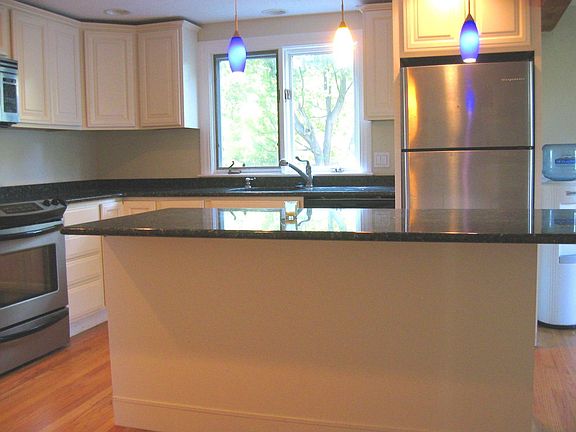 New granite and stainless kitchen