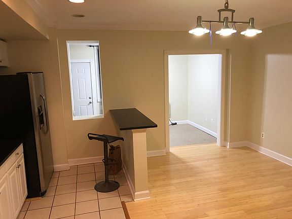 Kitchen looking into the den